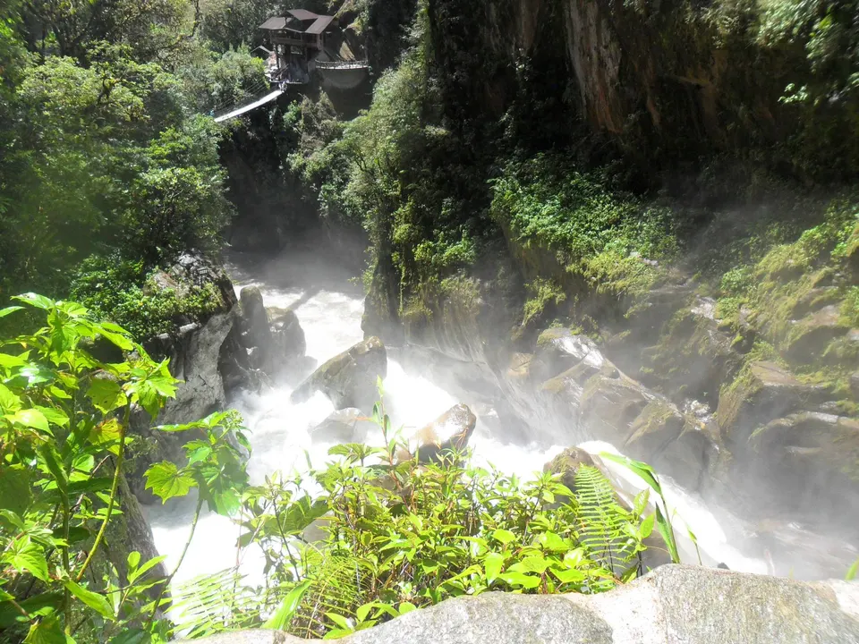 Base of Pailón del Diablo (Devil's Cauldron) Waterfall on the edge of the Amazon in Ecuador en banos-de-agua-santa