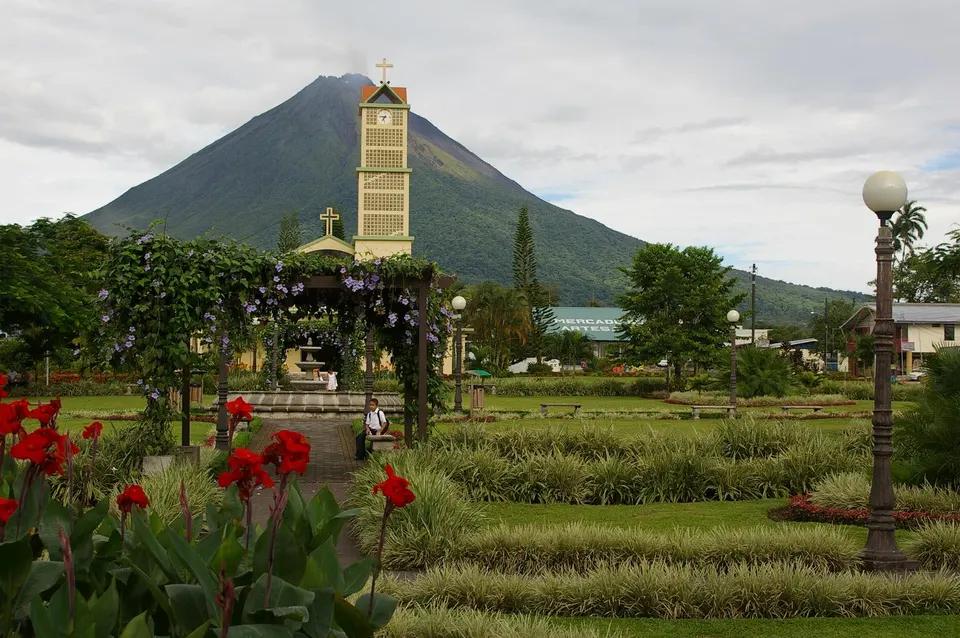 Volcano Arenal, seen here from the town of La Fortuna, remains active. Lava flows continue on the opposite side of the g en la-fortuna
