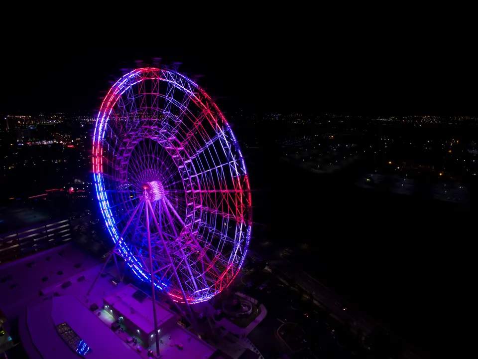 This aerial image was taken on September 11, 2015 when the Orlando Eye was displaying patriotic colors. en orlando