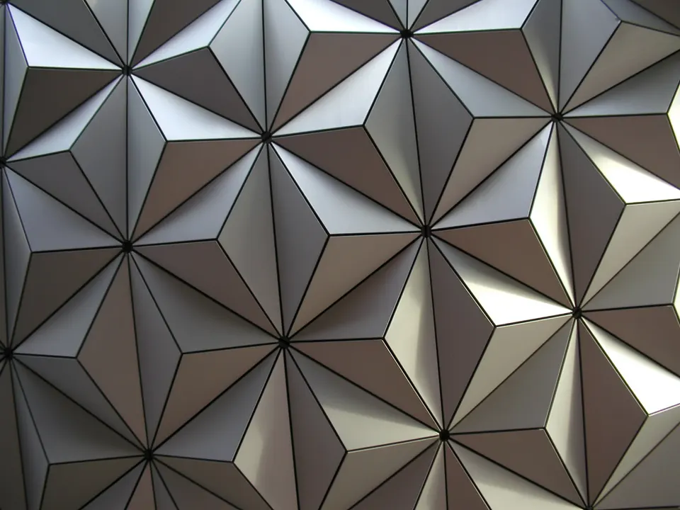 A close-up shot of Spaceship Earth's tiles at Epcot in Walt Disney World, made of Alucobond en orlando