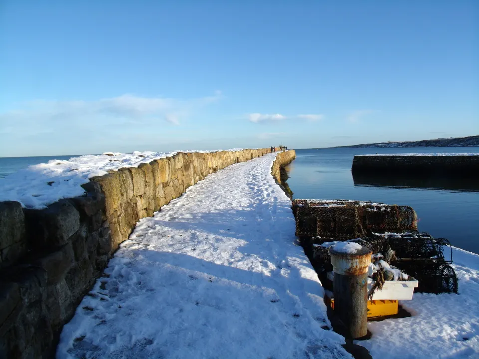 El muelle de piedra del puerto de St Andrews, escenario del tradicional Pier Walk.